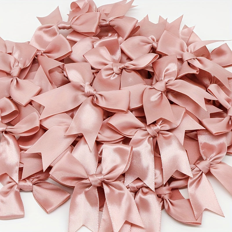 50 pieces of small pink and white satin ribbon bows measuring 8.38cm x 8.38cm for DIY crafting, gift tying, wedding decorations, and baking.