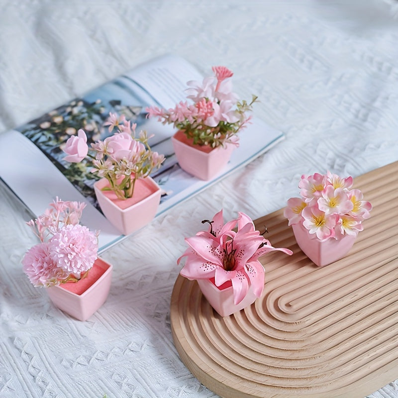 3 mini pink potted plants with faux rose and peach embroidered ball flowers for wedding, home, or office decoration.