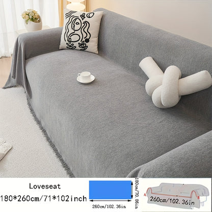 Contemporary chenille sofa throw, waterproof baby fleece cover, universal fit for all-season use. Features tassel embellishment and is machine washable. Made of 100% polyester, suitable for various furniture sizes in different rooms.