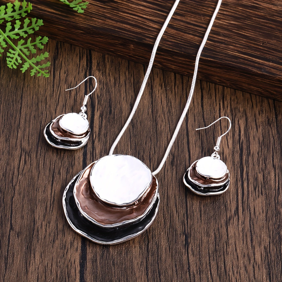 Chic and stylish Bohemian enamel jewelry set featuring a three-layer circular design made of zinc alloy. This adorable set makes a perfect gift for the special ladies in your life, ideal for holiday parties or as a girlfriend gift. Includes a necklace