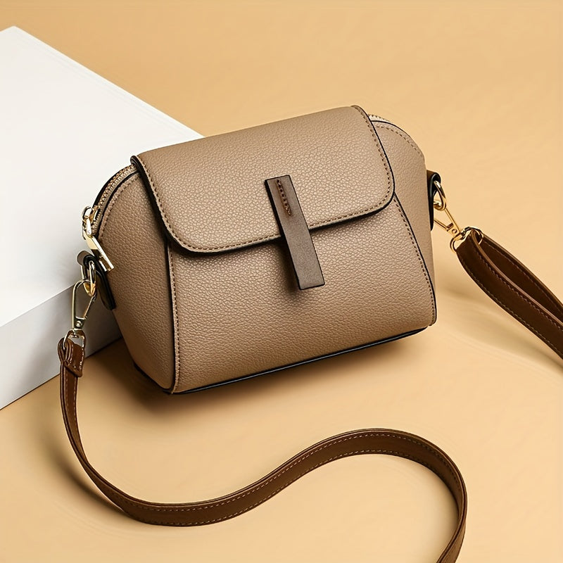 Stylish women's crossbody bag made of PU leather for daily use, measuring 7.1 x 5.1 x 3.5 inches.