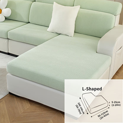 Jacquard sofa slipcover with universal fit and elastic design for furniture protection and home decor in any room.