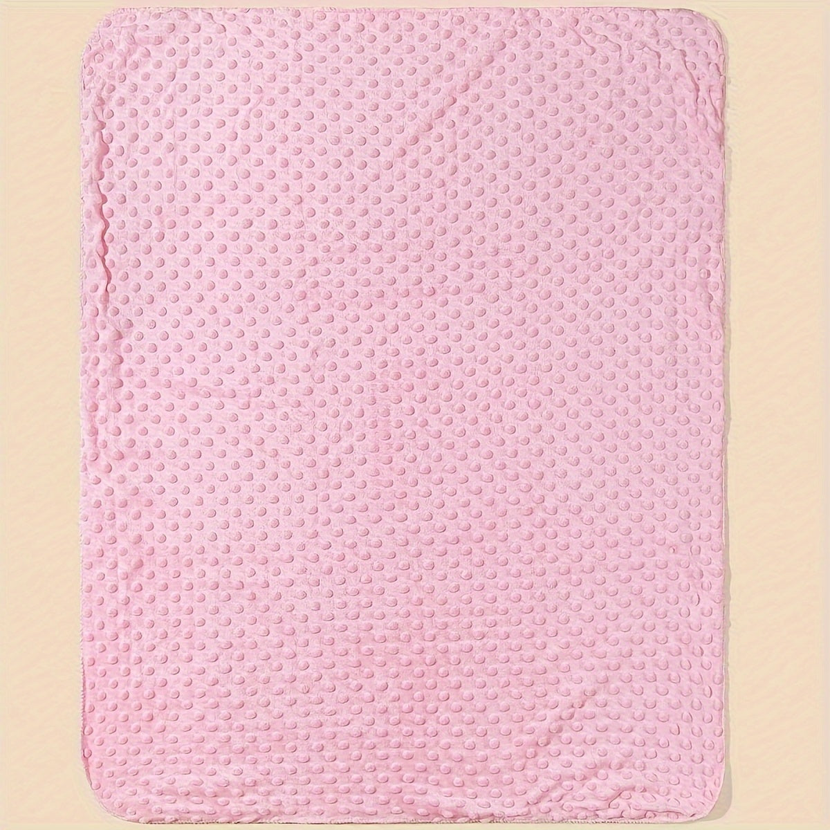 Soft polyester baby swaddle blanket featuring a woven pink, blue, and white dot pattern. This versatile infant wrap is perfect for all seasons and provides soothing comfort for your baby.