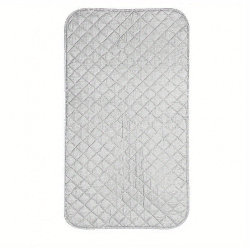 Portable Ironing Mat that does not require electricity, featuring a reusable heat-resistant cloth for pressing shirts and garments on-the-go. No need for an ironing board or plate, making it convenient for travel and home use.