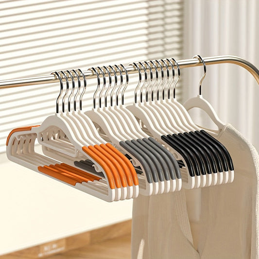 Set of 10 clothes hangers featuring a non-slip design, sturdy construction, and durable coating. Perfect for organizing and storing clothes in the bedroom, closet, wardrobe, or home. Ideal for drying and hanging clothes.