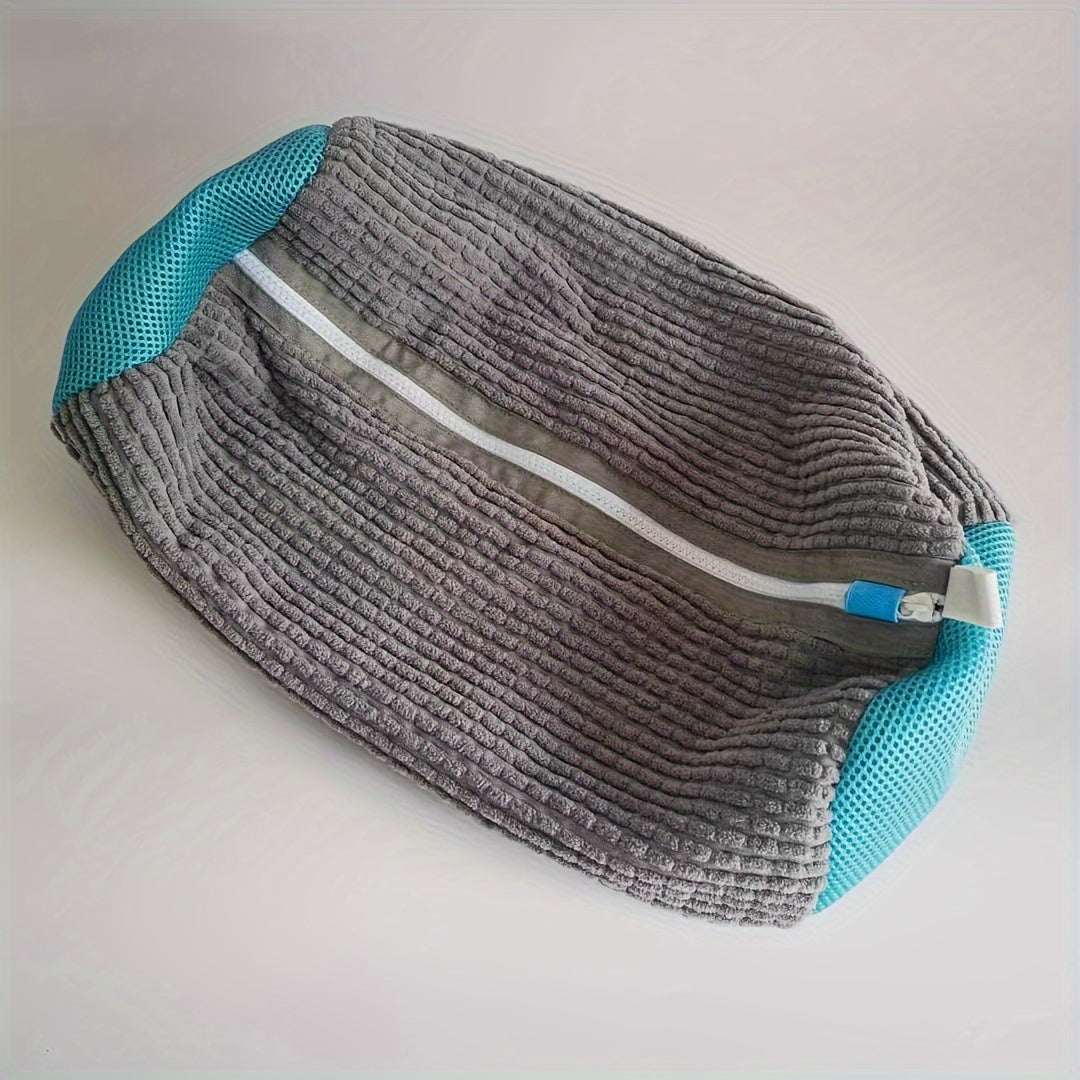 Yellow and teal zippered shoe wash bag for convenient laundry care of sneakers. Made of anti-deformation polyester with a mesh bottom and oval shape. Perfect for keeping your shoes clean and protected during the laundry process.