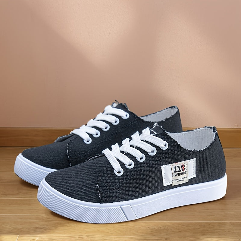 1 pair of women's casual canvas sneakers with round toe, lace-up design, lightweight rubber sole, and fabric insole.