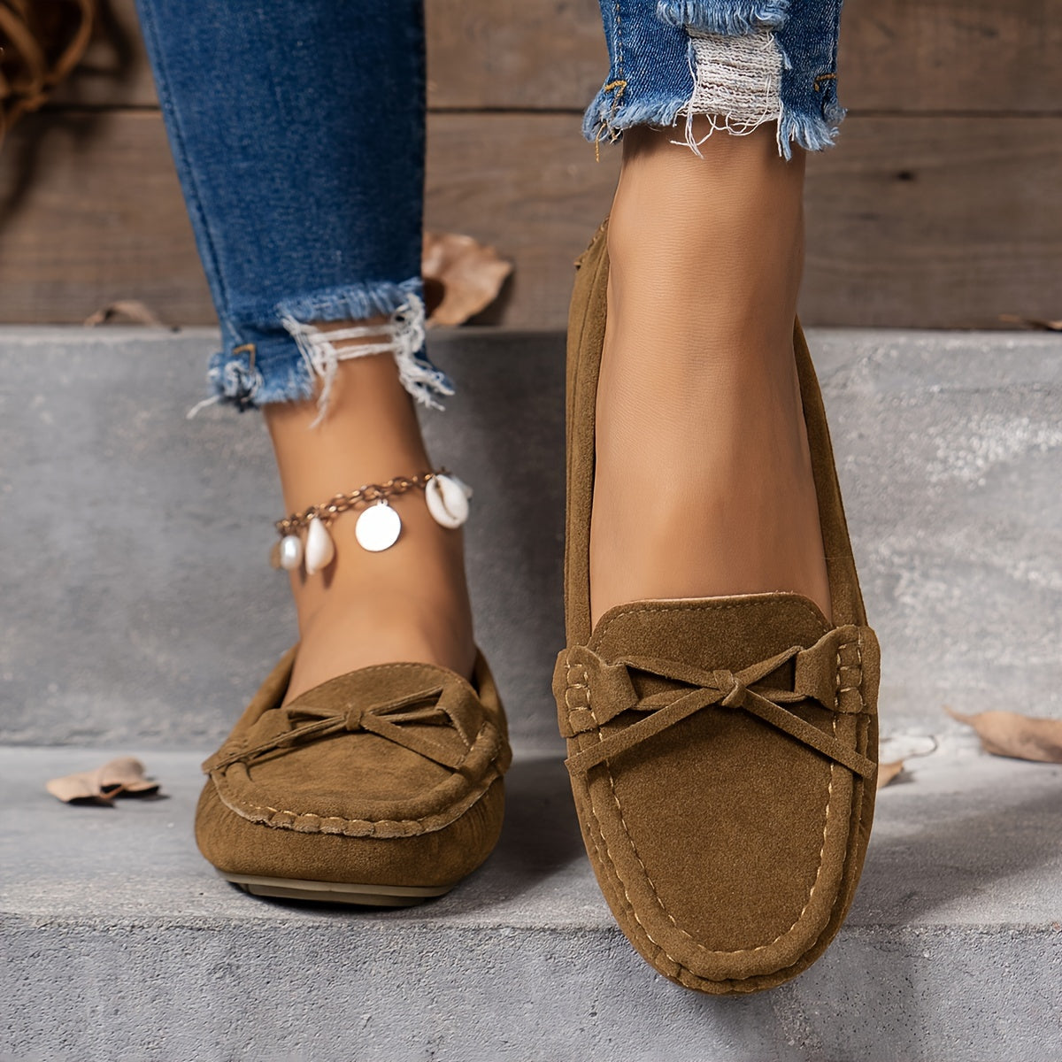 Retro flat loafers with bow detail, slip on style, and soft sole for casual wear.