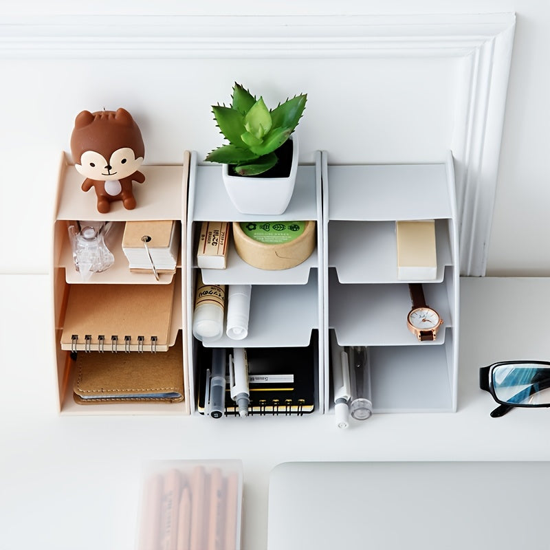 Pocket folder with grid remote control box for organizing cosmetics on desktop.