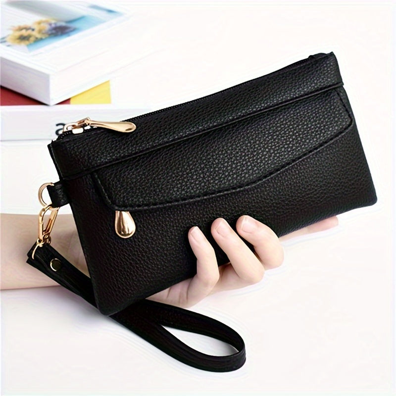 Chic black wristlet clutch with zipper, multi-compartments, golden hardware. Ideal for everyday use.