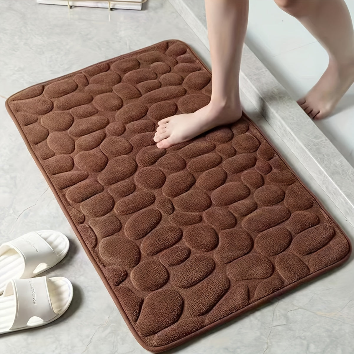 Pamper Your Feet with our Luxurious 3D Pebble Design Bath Rug! This Quick-Dry Non-Slip Bathroom Mat is made of Soft and Comfortable Polyester Memory Foam. It is Woven with a density of 700gsm and is 1.5cm Thick. Perfect for Home Decor and as Holiday