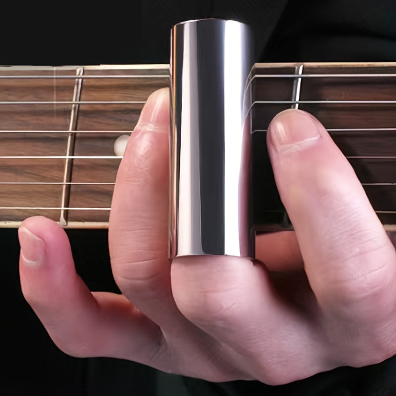 1 Guitar slide stick and finger ring made of glass or stainless steel, with finger sleeve made of clear glass or bakelite.