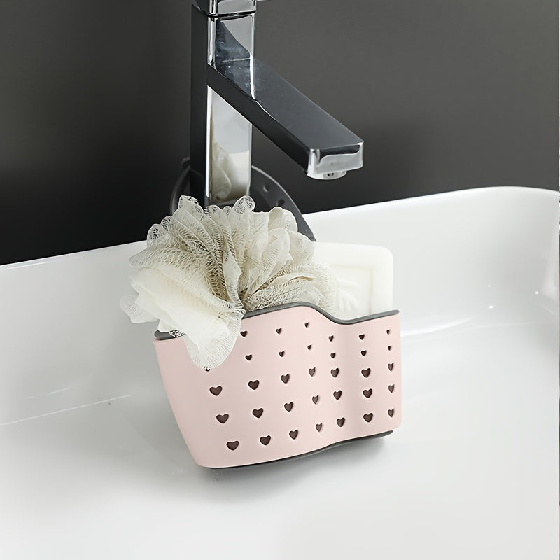 Introducing the BANUCHE Dual-Layer Sink Organizer - a versatile kitchen storage rack featuring heart-shaped handles, faucet hanging sponge, and utensil basket. Available in beige, gray, and blue, this durable plastic organizer requires no power and is