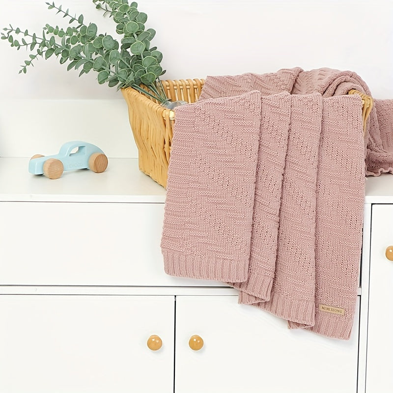 Soft, solid color blanket perfect for home and travel use, hand-knitted with care.