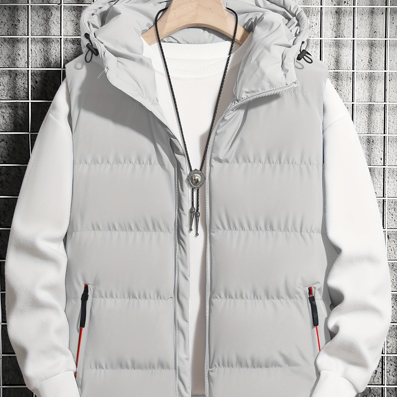 Men's casual hooded puffer vest with pockets, perfect for autumn/winter outdoor wear.