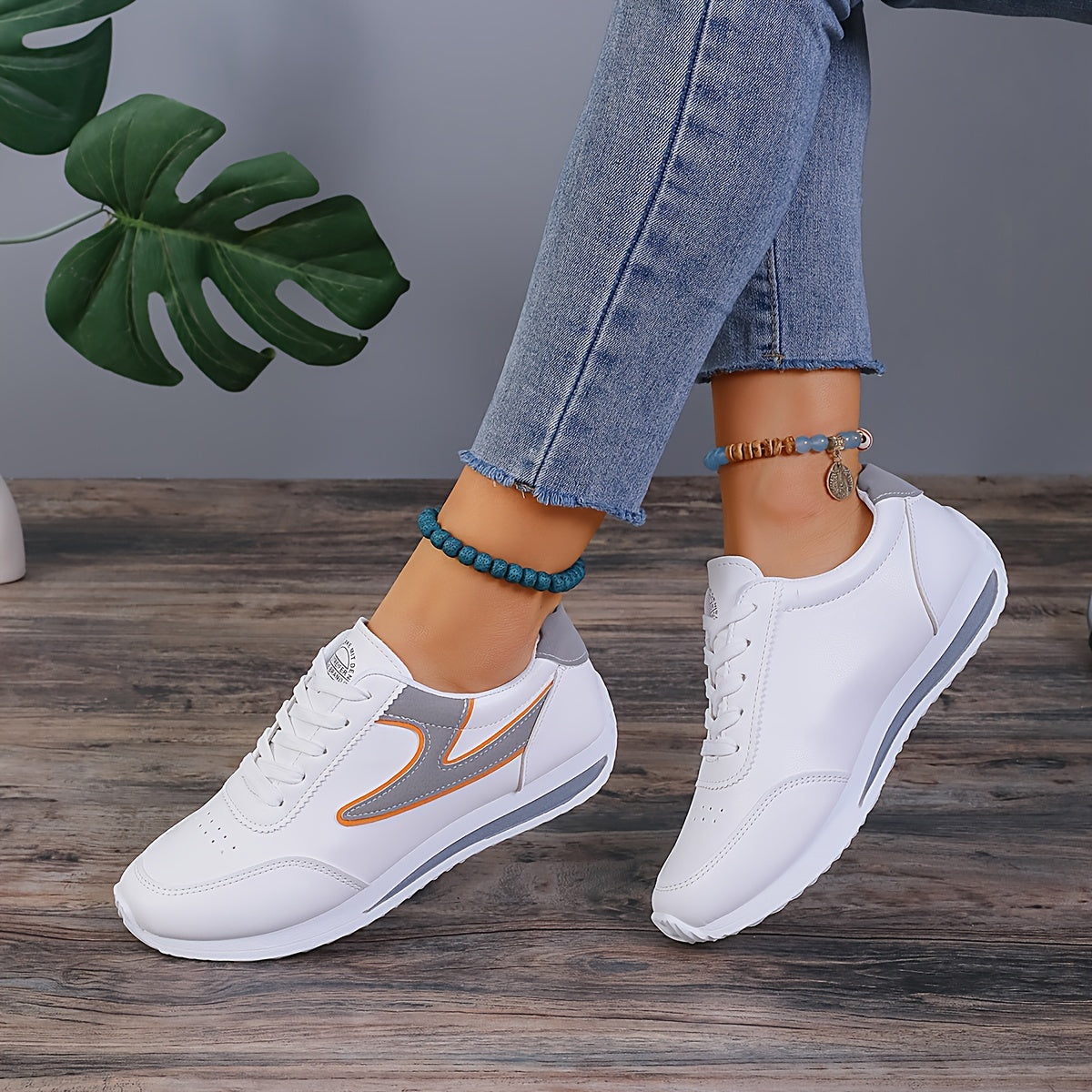 Trendy colorblock women's sneakers with soft platform sole, lace-up design, perfect for casual walking.