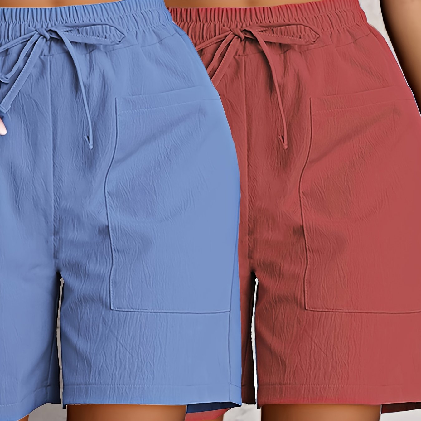 2-Pack of Women's breathable cargo shorts in solid colors. Made of lightweight polyester with dual pockets and drawstring detail. All-season fashion.