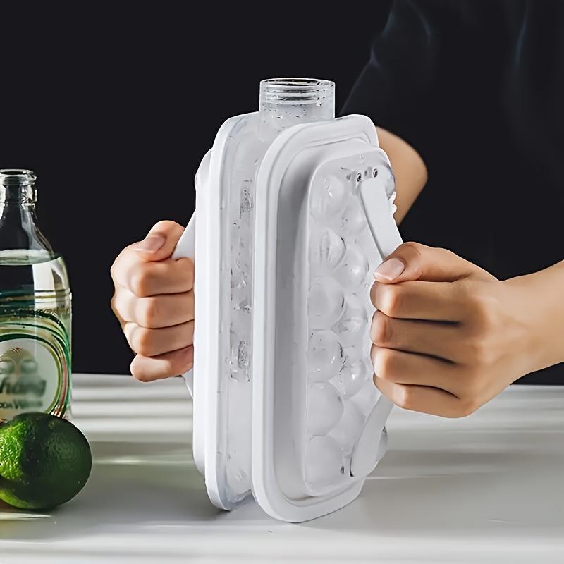 Foldable ice maker bottle with tray, high-capacity ice maker, and silicone molds for refrigerator.