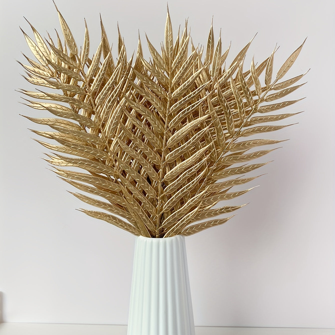 10pcs Luxurious Golden Willow Leaves - Realistic Artificial Plastic Foliage for Festive Home & Party Decor, Perfect for New Year's & Spring Festival Celebrations, Flower Arrangement Accessories.