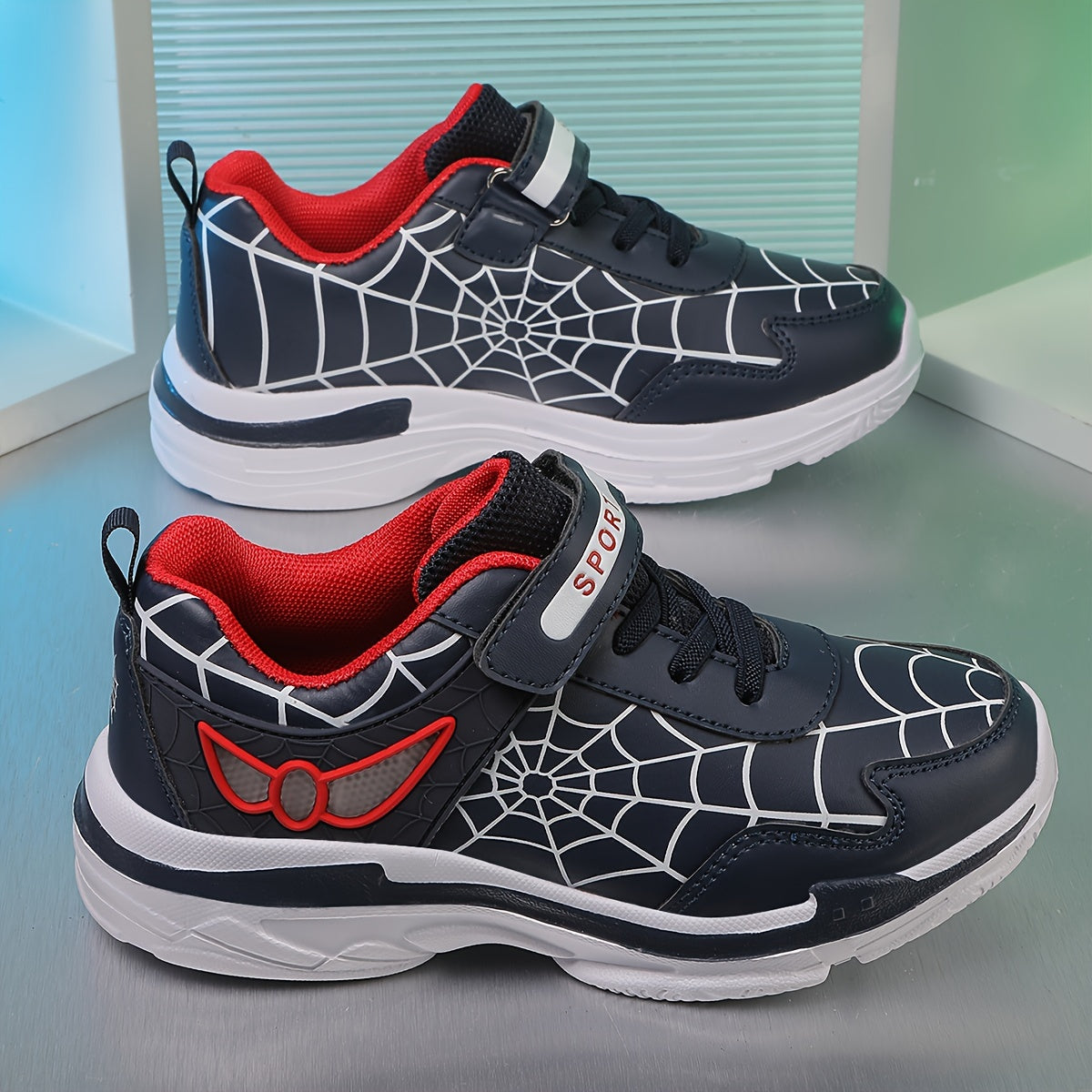 Kids sport sneakers with cartoon spider web design, lightweight and breathable, suitable for boys and girls. Ideal for outdoor activities all year round.