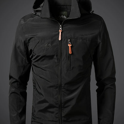 Men's lightweight hooded polyamide jacket with zipper closure and polyester lining, ideal for hiking and outdoor activities in the spring/fall season.