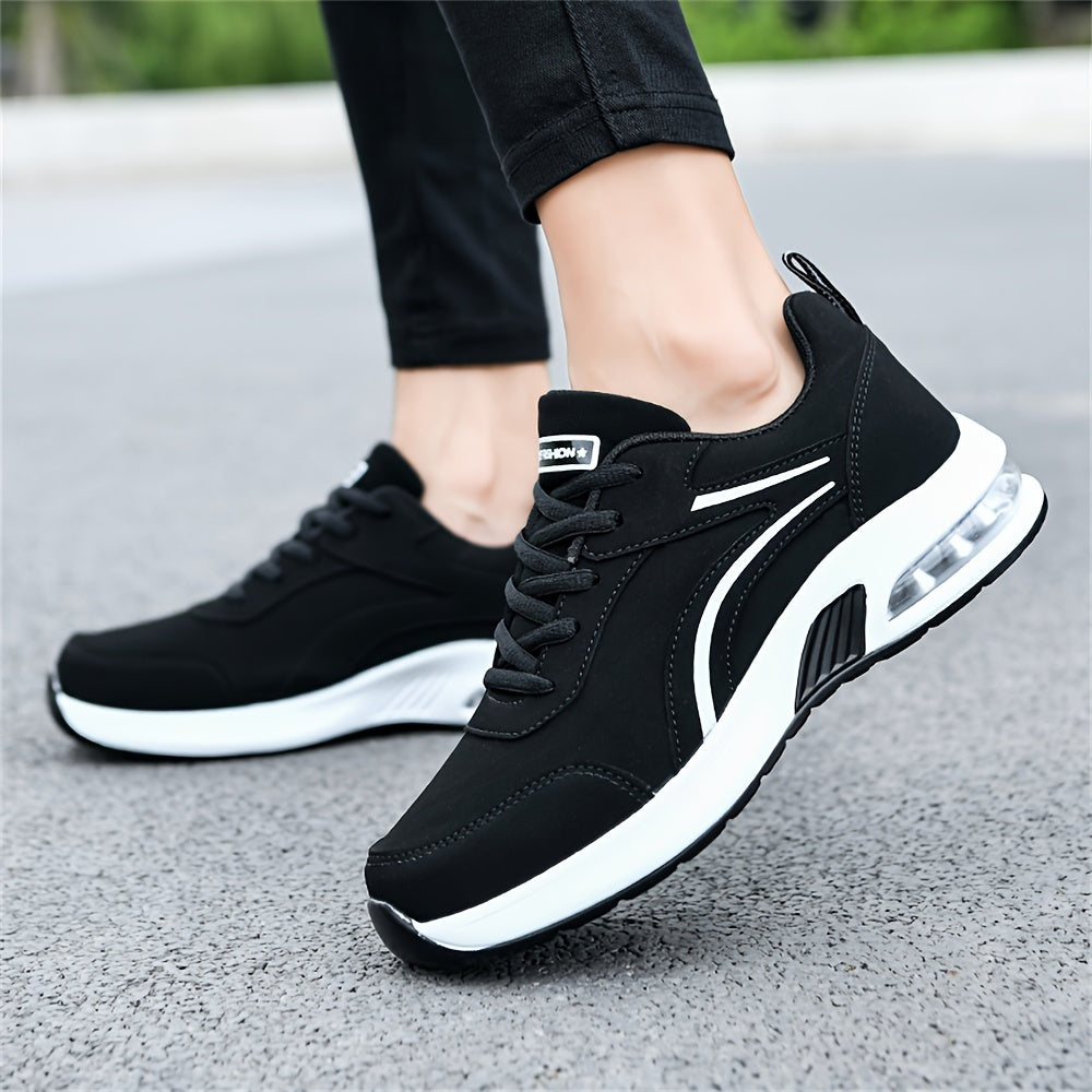 Women's casual sneakers made from black synthetic leather, featuring a lightweight design, air cushion support, lace-up style suitable for work, travel, or sports. Stylish and breathable