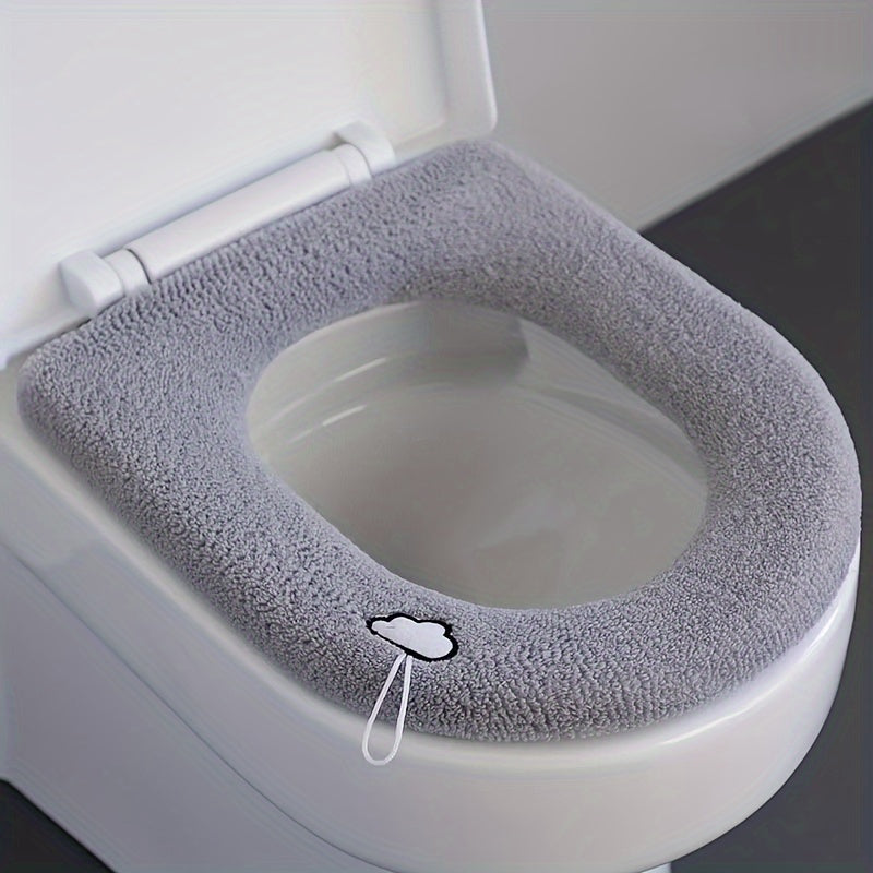 Soft, warm plush toilet seat cover for all seasons. Perfect bathroom accessory or holiday gift.