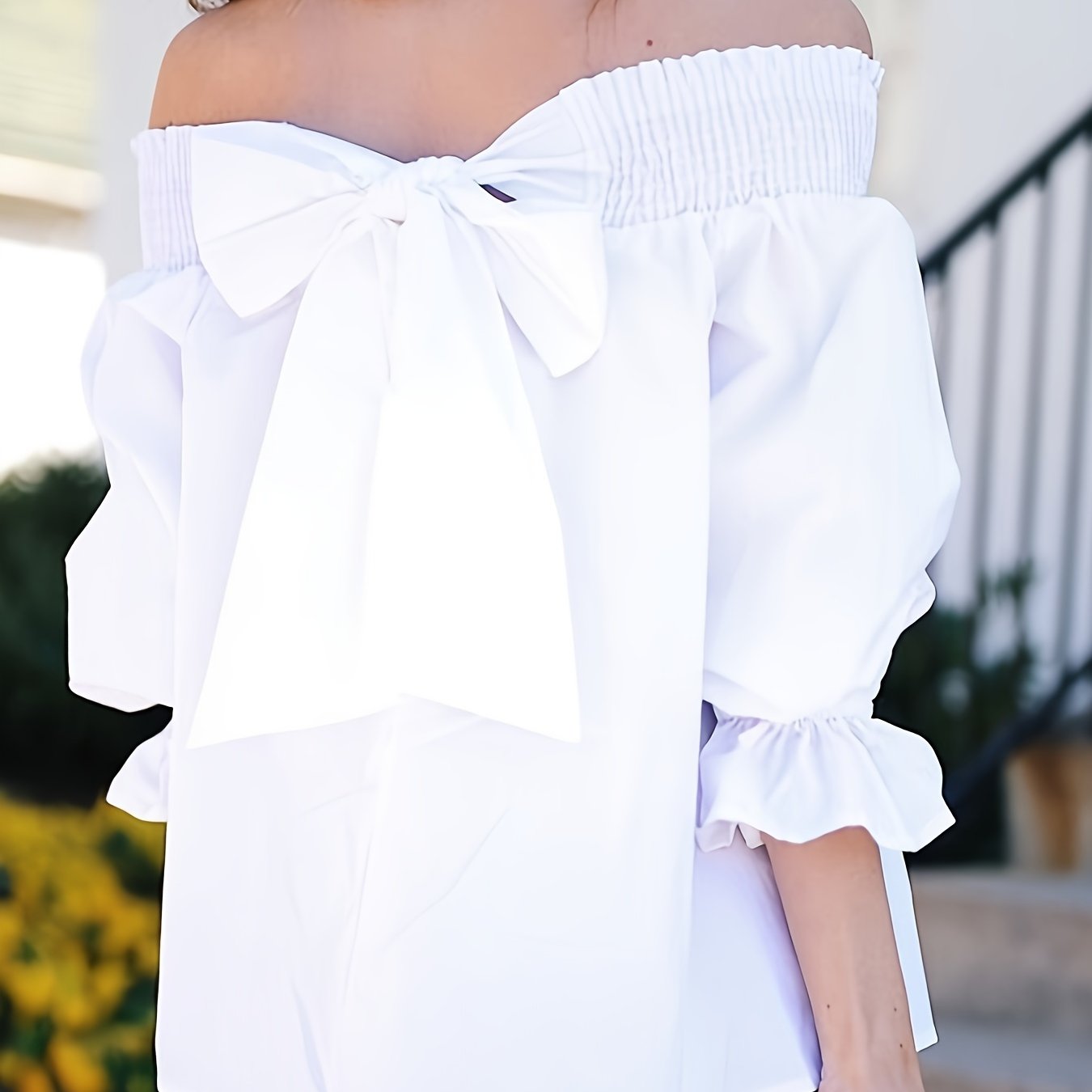 Off-shoulder blouse with bow back, shirred half sleeves, perfect for spring & summer in plus size women's clothing.