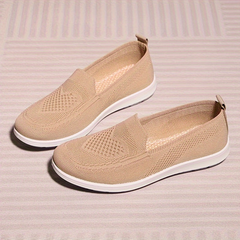 Women's slip-on flats with comfortable fabric upper, flax insole, and faux sole for easy daily wear.