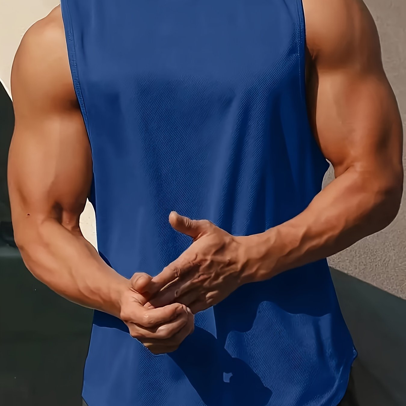 Men's quick-dry, moisture-wicking tank tops for gym, bodybuilding, and sports activities. Great for workouts and playing basketball.