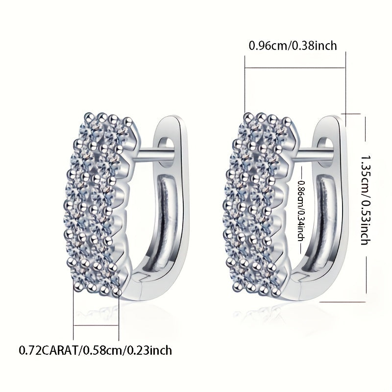 These elegant double row stud earrings feature a total of 0.72 carats of sparkling Moissanite stones set in 925 Sterling Silver. Perfect for daily wear, these earrings exude a sense of luxury and high-end design, with a touch of European and American