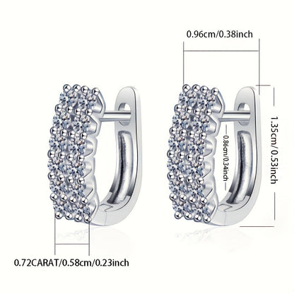 These elegant double row stud earrings feature a total of 0.72 carats of sparkling Moissanite stones set in 925 Sterling Silver. Perfect for daily wear, these earrings exude a sense of luxury and high-end design, with a touch of European and American