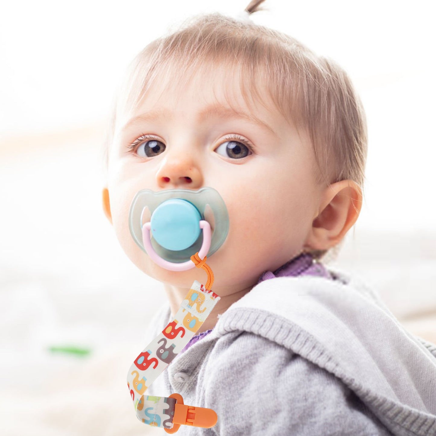 Ensure Your Baby's Pacifier and Teethers Stay Securely Attached with Our Baby Pacifier Holder Clip - Perfect for Boys and Girls. The Ideal Halloween, Thanksgiving, or Christmas Gift!