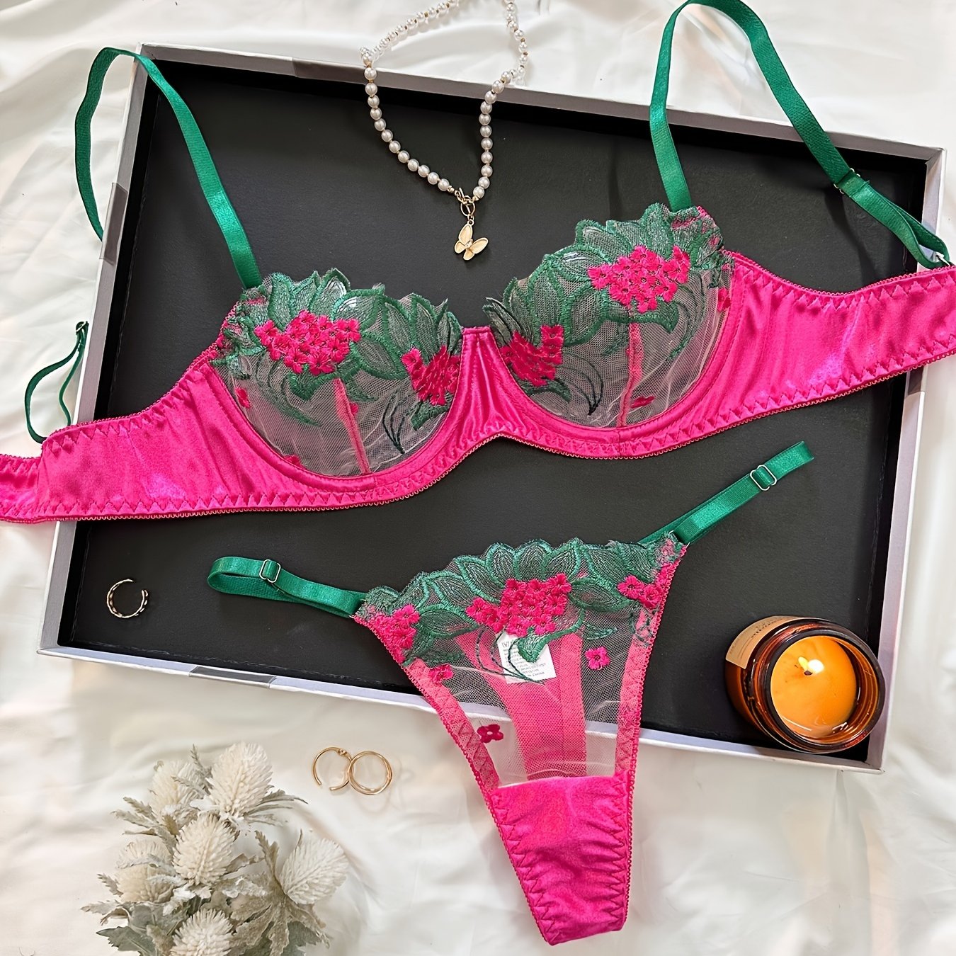 Floral embroidered mesh lingerie set for adult women, made of 95% polyester and 5% elastane.