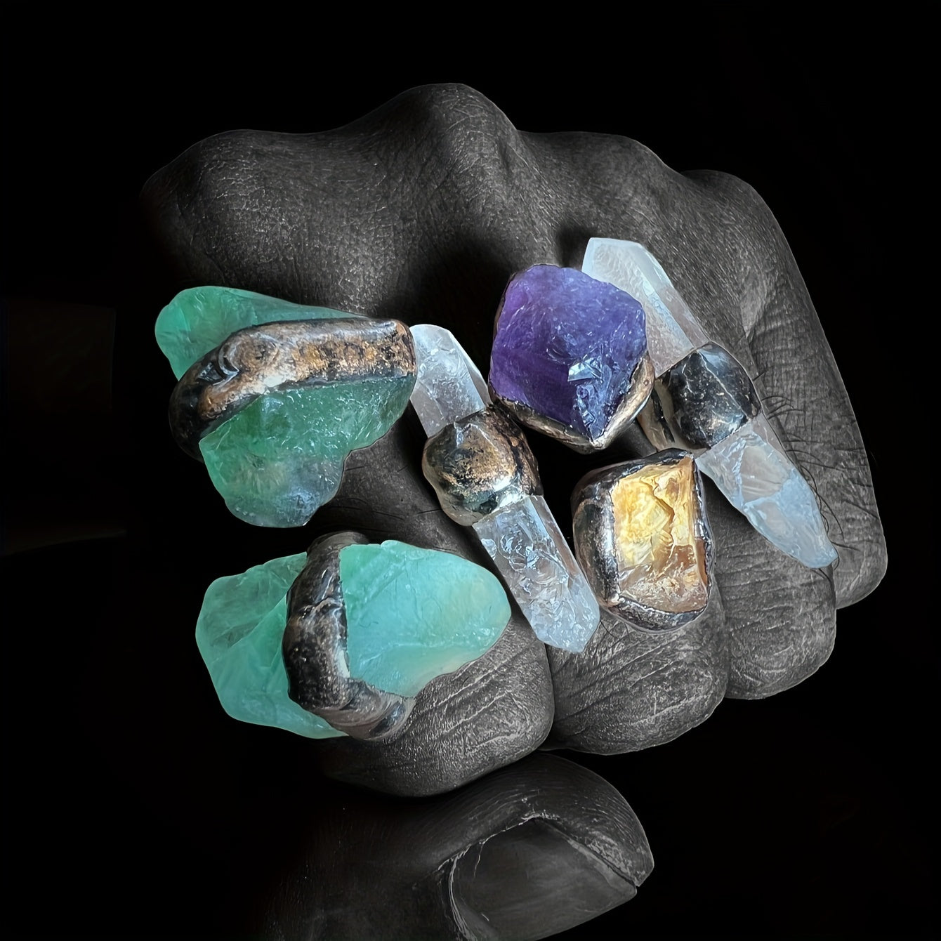 Handmade from natural crystals, this one-of-a-kind ring showcases a beautiful mix of light and dark colors, random shapes, and unique fluff and sand cracks. These characteristics are not flaws, but rather natural phenomena that make each piece truly