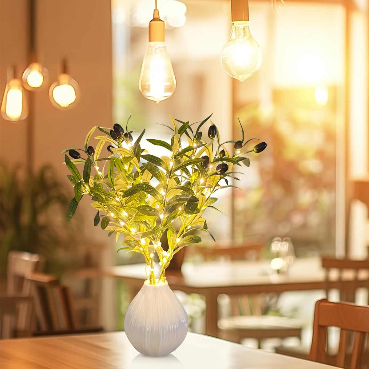 Olive Branch LED Lamp with Fairy Lights and artificial greenery tree. Ideal for various occasions. Mixed color, battery-operated with button control. Modern and festive accent.