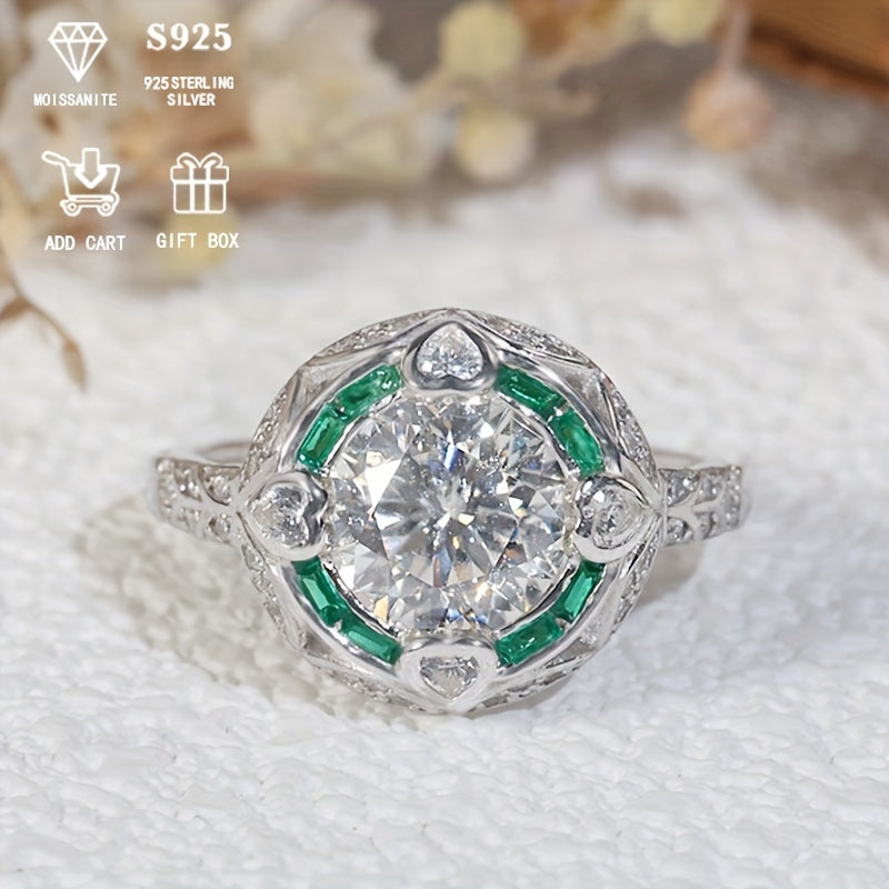 Luxurious Royal Style 2 Carat Moissanite Engagement Ring for Ladies, made with 925 Sterling Silver, adorned with Heart Accents, featuring a Round Gemstone. This Hypoallergenic S925 Wedding Band makes a perfect Anniversary Gift that comes with a Gift Box.