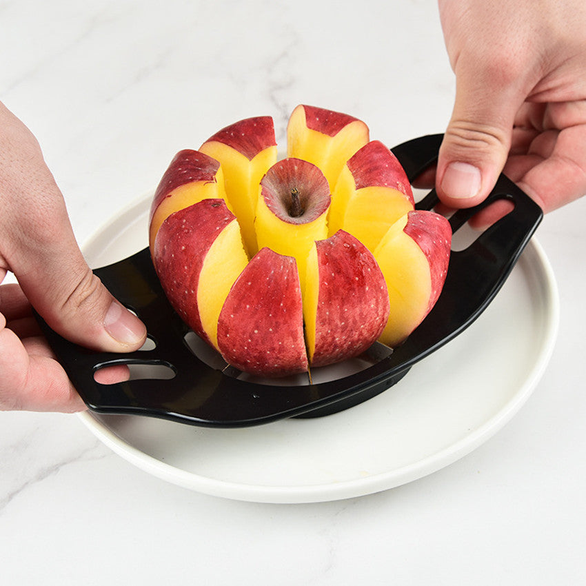 Apple Slicer and Corer made of durable stainless steel with uniform blades and ergonomic handle for perfectly sliced fruit.