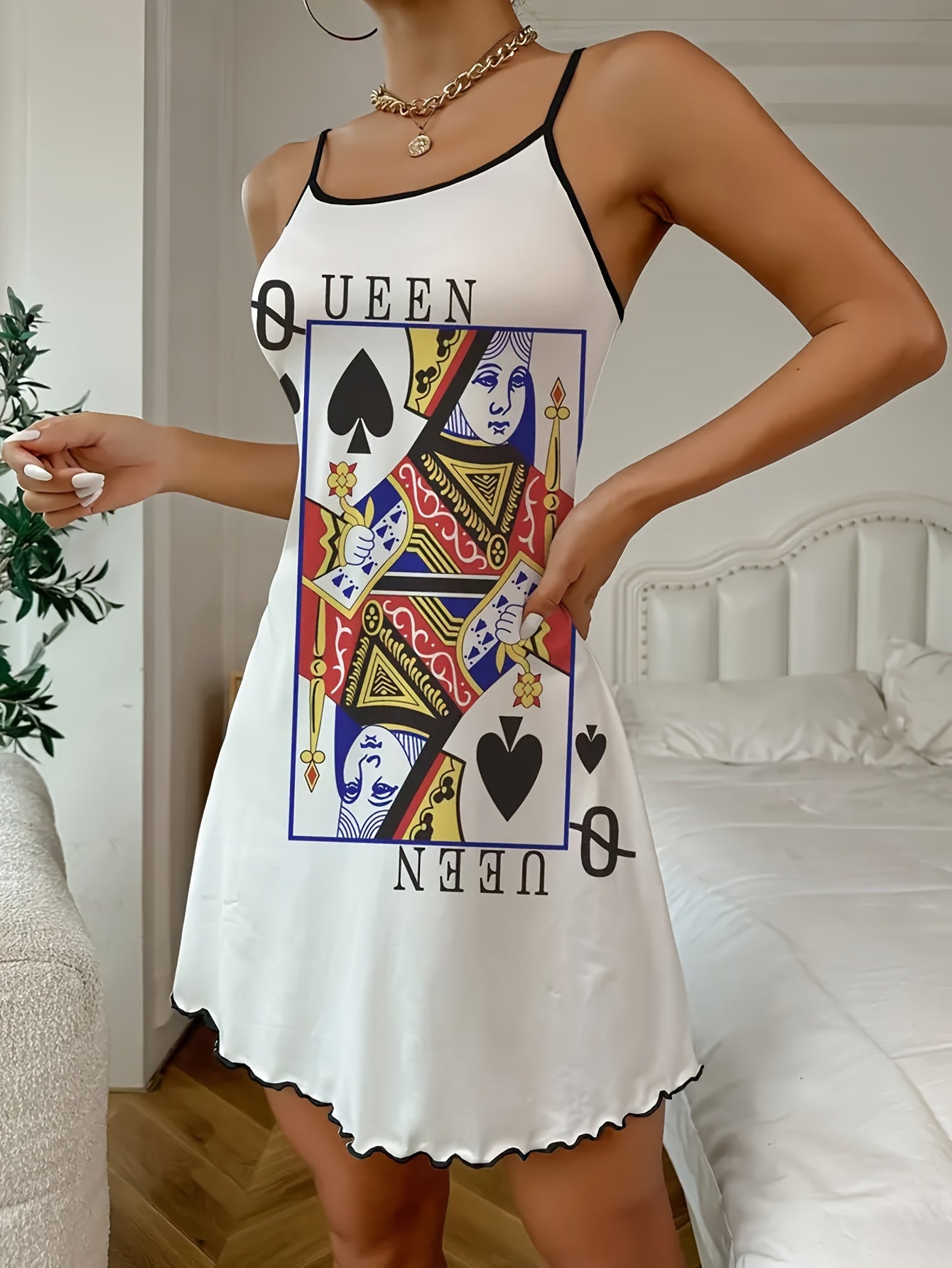 Stylish women's backless nightgown with poker print and ruffle trim, made from soft, stretchy polyester blend. Suitable for all seasons.