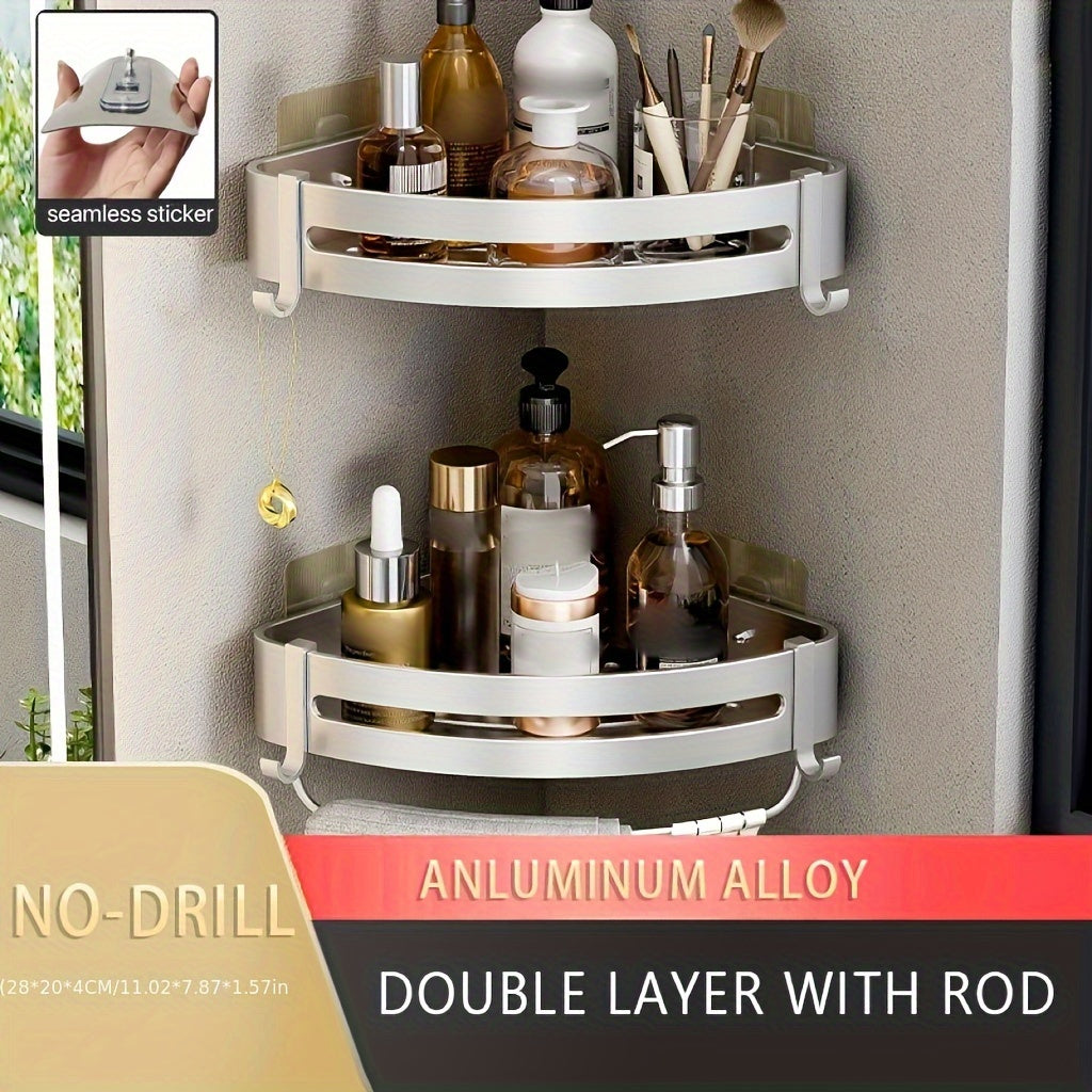 Wall-mounted bathroom storage rack for shampoo, shower gel, and cosmetics; made of space aluminum with no need for drilling.