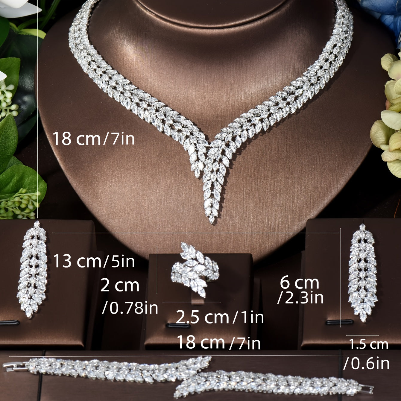 Elegant Leaf-Shaped Jewelry Set with Sparkling Zirconia, 18K Gold Plated Copper. Includes Earrings, Necklace, Bracelet, and Ring. Perfect for Weddings, Parties, and Bridal Wear.