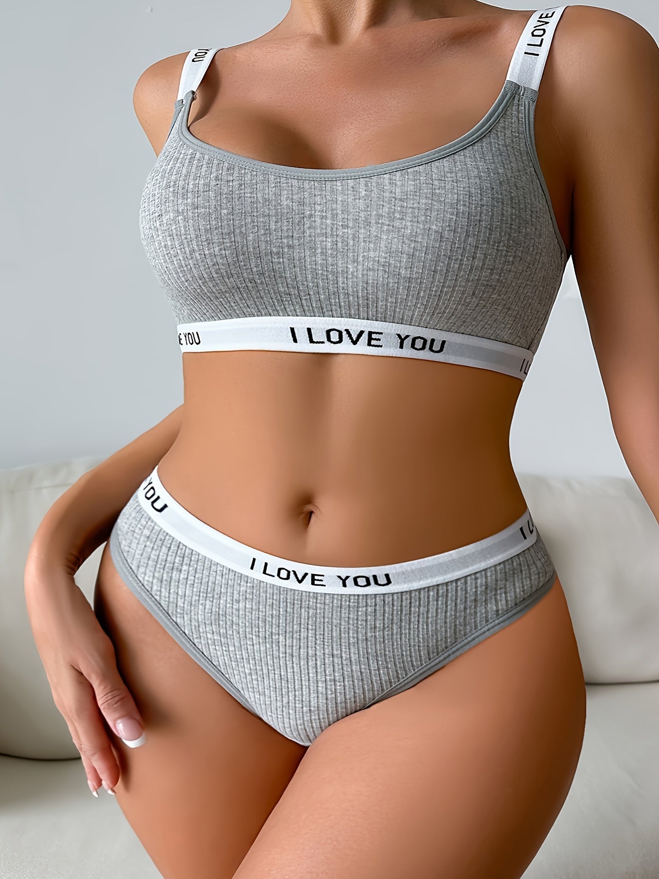 Plus size ribbed letter tape seamless bra and panty lingerie set for women.