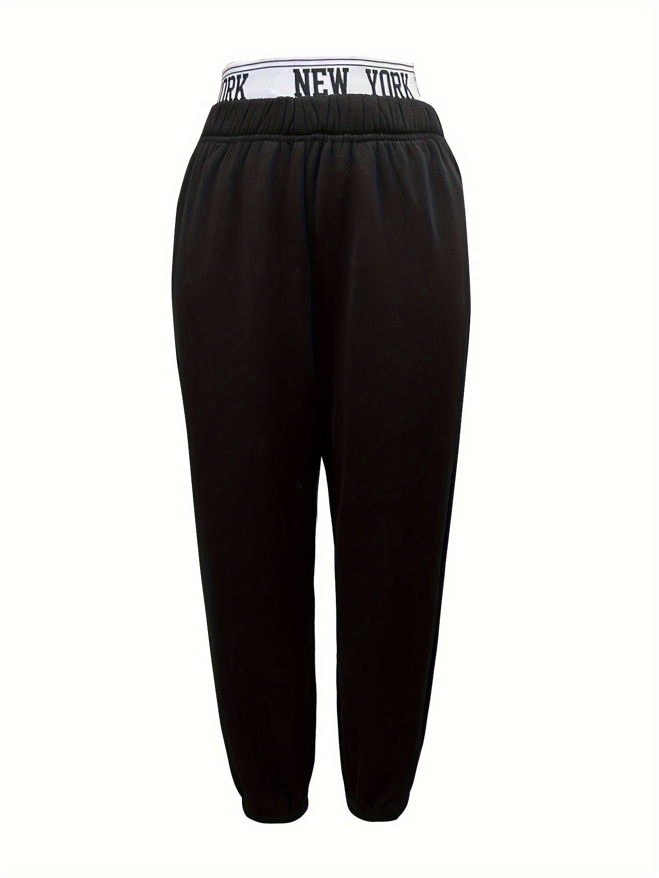 Women's casual jogger pants with elastic waistband, skeleton hands embellishment, and letter detail. All season knit joggers with cuffed ankles.