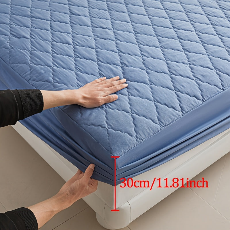 Diamond quilted waterproof bed sheet protector made of 100% woven polyester. Machine washable and available in multiple sizes (pillow shams not included).