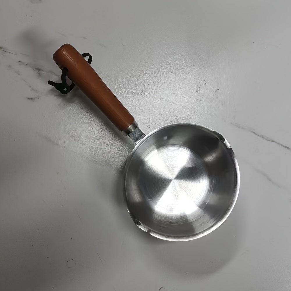 This Stainless Steel Mini Skillet features a Wooden Handle, making it ideal for Hot Oil & Food Prep. Perfect for use in Home Kitchens & Restaurants alike.