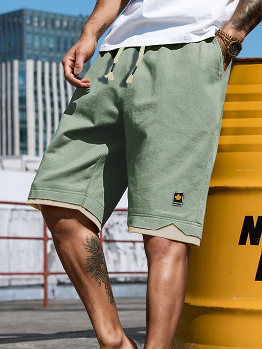 Men's casual elastic waist shorts with pockets for summer, featuring a two-piece design.