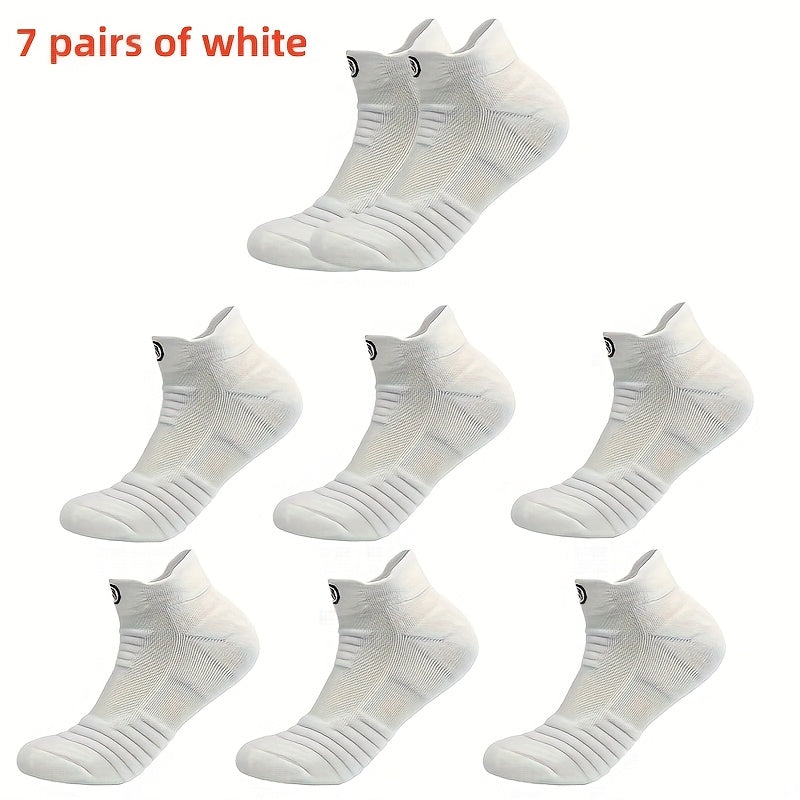 5 pairs of high-performance athletic compression socks for men in gray, black, and white. Made with breathable polyester and sweat-wicking material with a towel bottom, featuring a