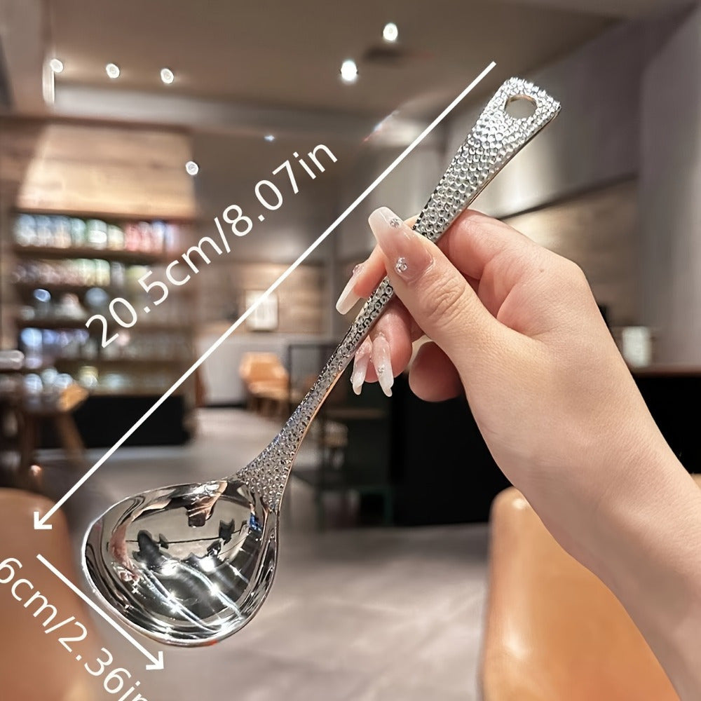 Sleek stainless steel long-handled spoon with leak-proof design, ideal for home and restaurant use.