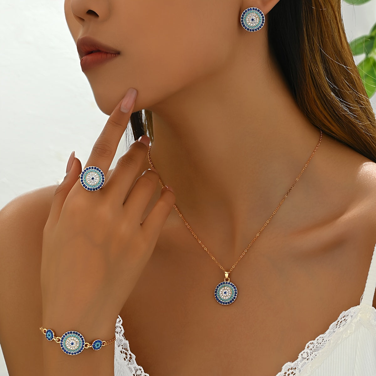 Women's jewelry set includes a geometric round necklace, ring, bracelet, and earrings, all crafted from alloy with rhinestone inlay. This vintage ethnic style set is a versatile fashion accessory perfect for daily wear and gift-giving, suitable for all