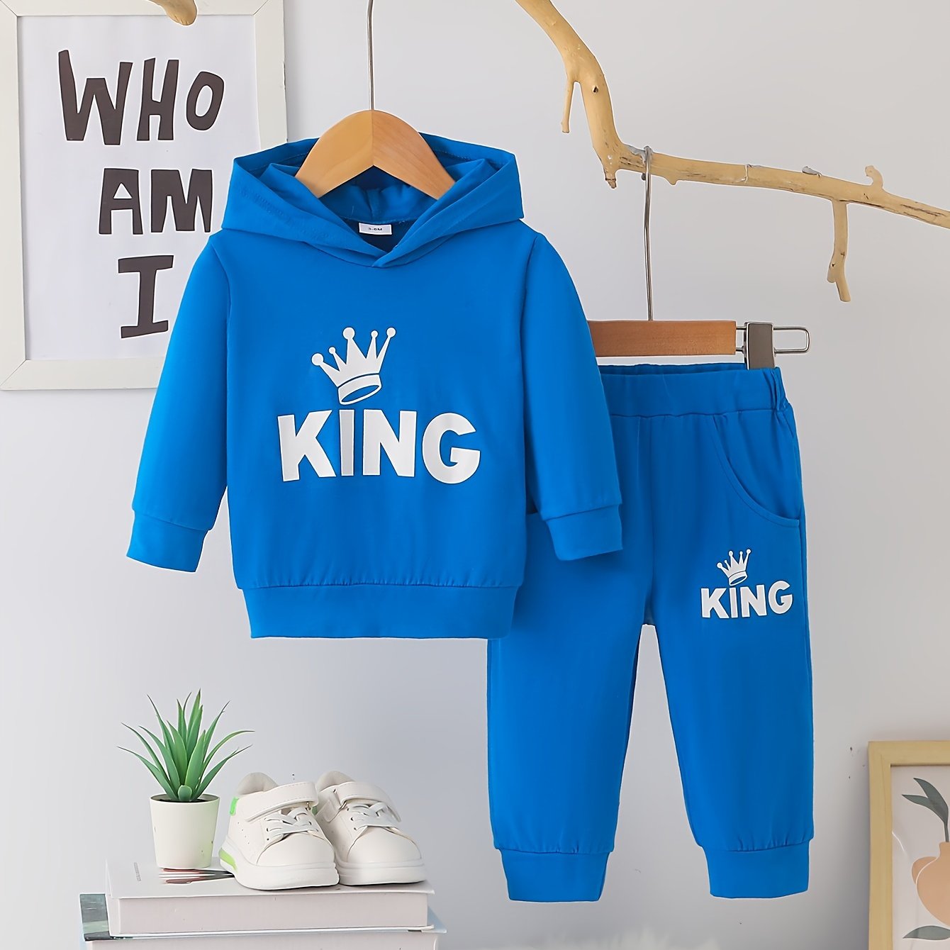 Baby boy's casual outfit set with hooded sweatshirt featuring KING print and matching pants.